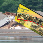 A giant postcard rest upon a destroyed home near Columbia, MO